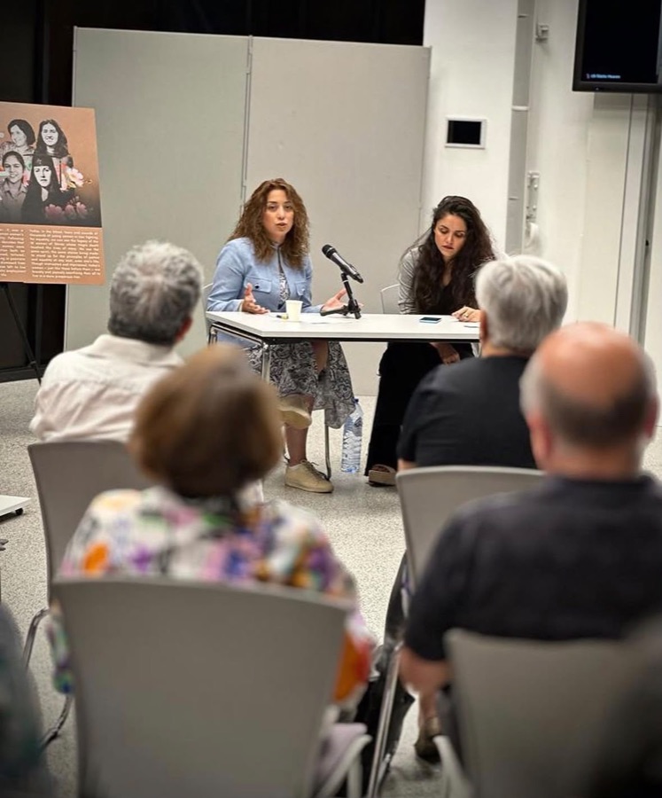 Parastoo Fatemi speaking to a seated audience