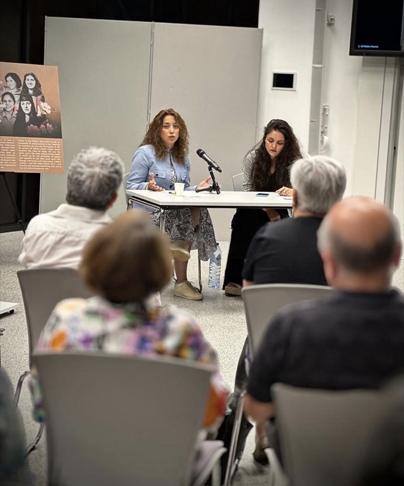 Speakers at a table addressing an audience at the University of Luxembourg